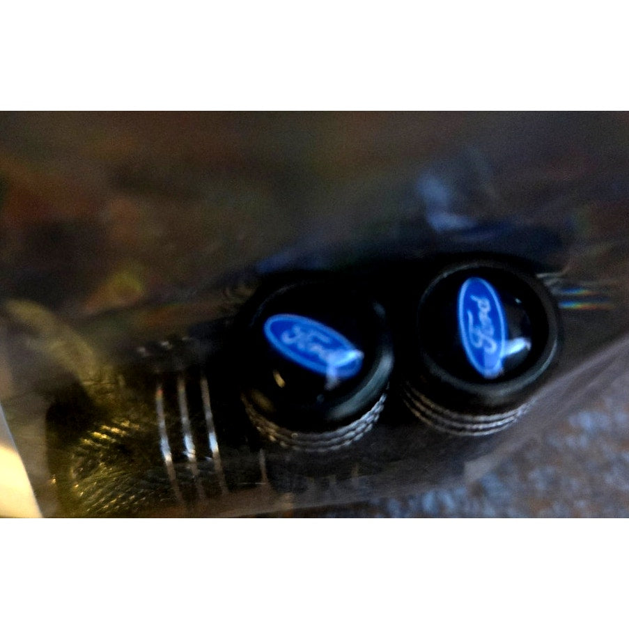 New Set of 4 Black Aluminum Ford Valve Stem Caps w/ Blue Emblem